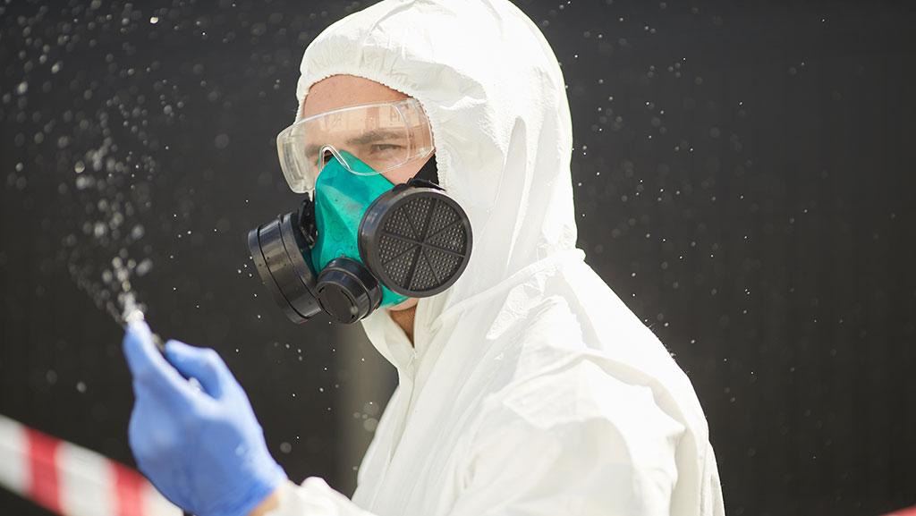 Chest Portrait Male Worker Wearing Hazmat Suit Holding Disinfection Gear