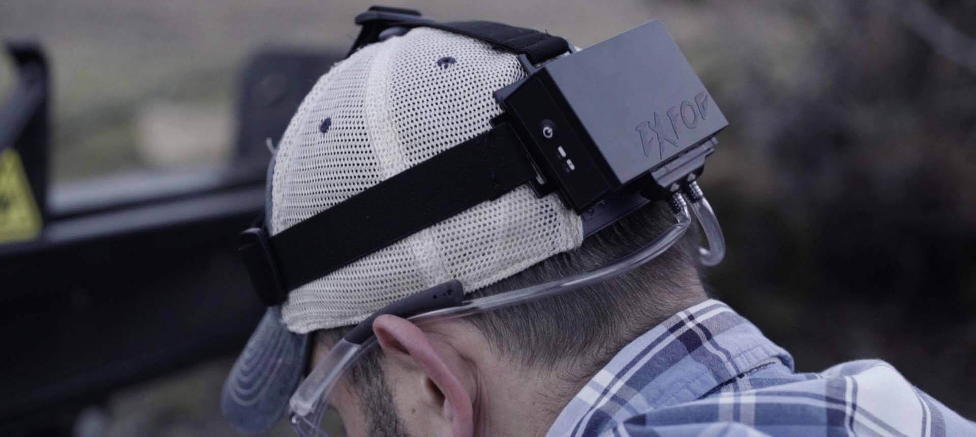 Man wearing trucker hat with Exfog system